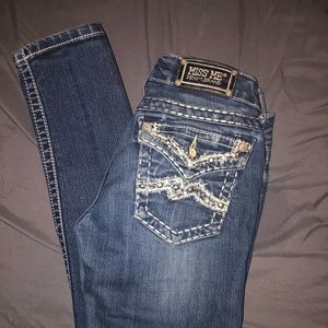 Buckle jeans. Miss Me. Denim brand.